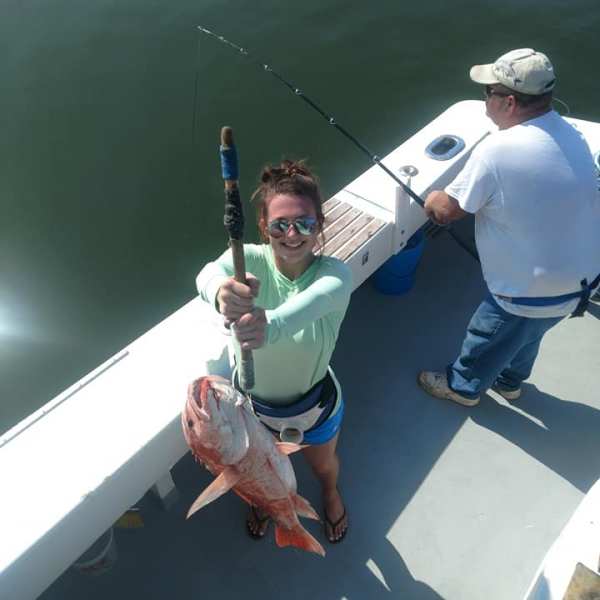 a man on a boat in the water